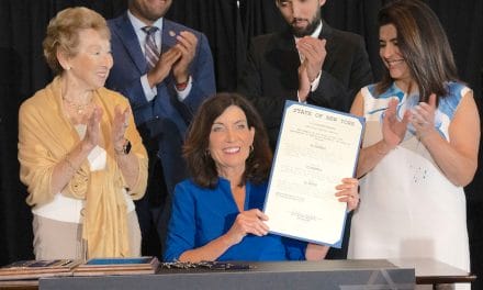 New York governor signs legislation to aid Holocaust survivors, support education